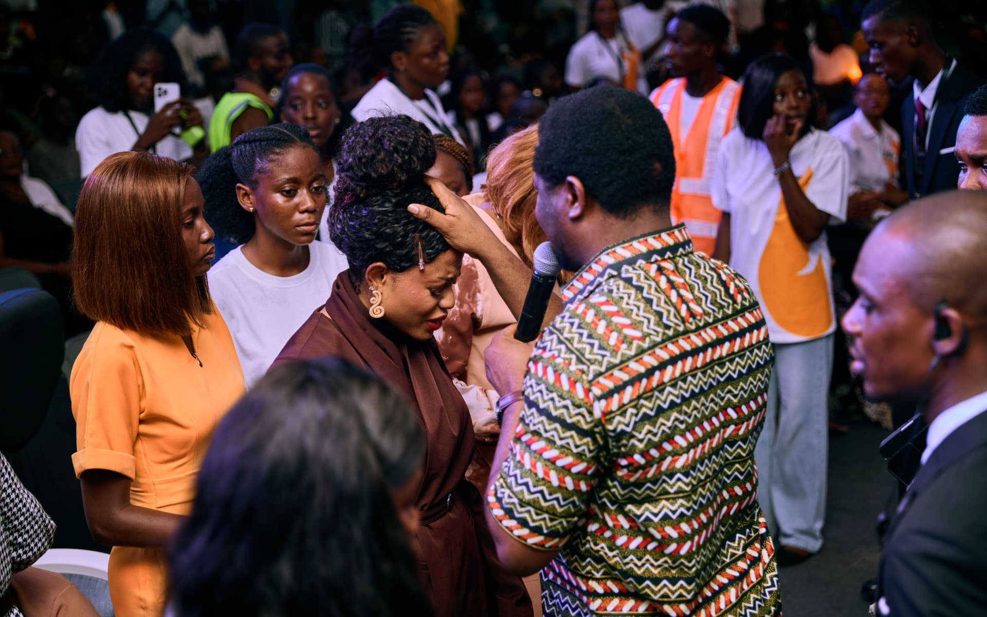 Leader speaking on stage at Heal Africa event